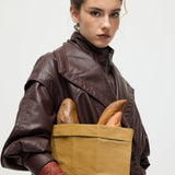 Vöökohtadega nahktagi pruunis