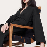 V-kaelusega puuvillane twill midi kleit mustas