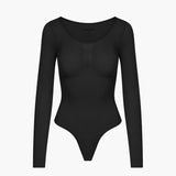 Bodysuit kujundav shapewear pikkade varrukatega koos stringiga