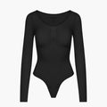 Bodysuit kujundav shapewear pikkade varrukatega koos stringiga
