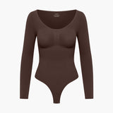 Bodysuit kujundav shapewear pikkade varrukatega koos stringiga