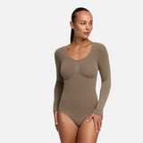 Bodysuit kujundav shapewear pikkade varrukatega koos stringiga
