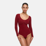 Bodysuit kujundav shapewear pikkade varrukatega koos stringiga