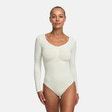 Bodysuit kujundav shapewear pikkade varrukatega koos stringiga