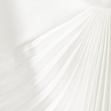 Asümmeetriline plekitud midi kleit valges