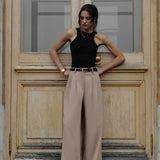 Löngad püksid voldikutega pruunis