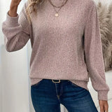 Ribbeltrui met ronde hals